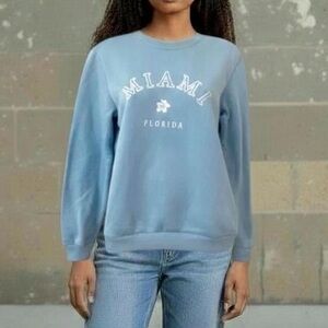 (NWOT) SHEIN Women’s Miami Florida Light Blue Sweatshirt. Medium